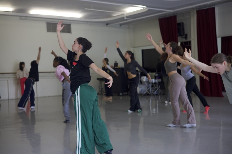 Group of dance students training in a rehearsal studio